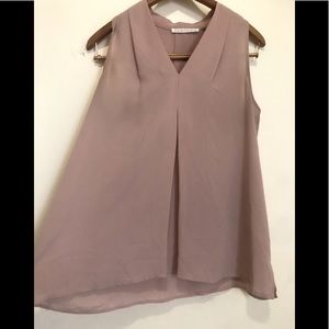 Sleeveless swing top